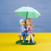 Romance under Umbrella Couple Showpiece